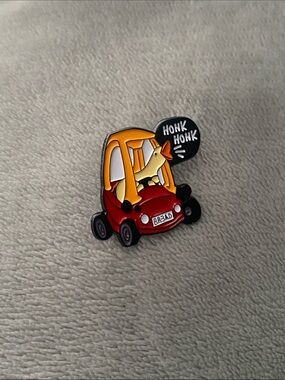 Enamel Pin with a duck in a toy car